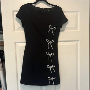Lulu's Black Sheath Mini Dress with Silver Bow Accents